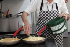 making omlette in kitchen